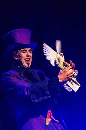 gala magician with bird